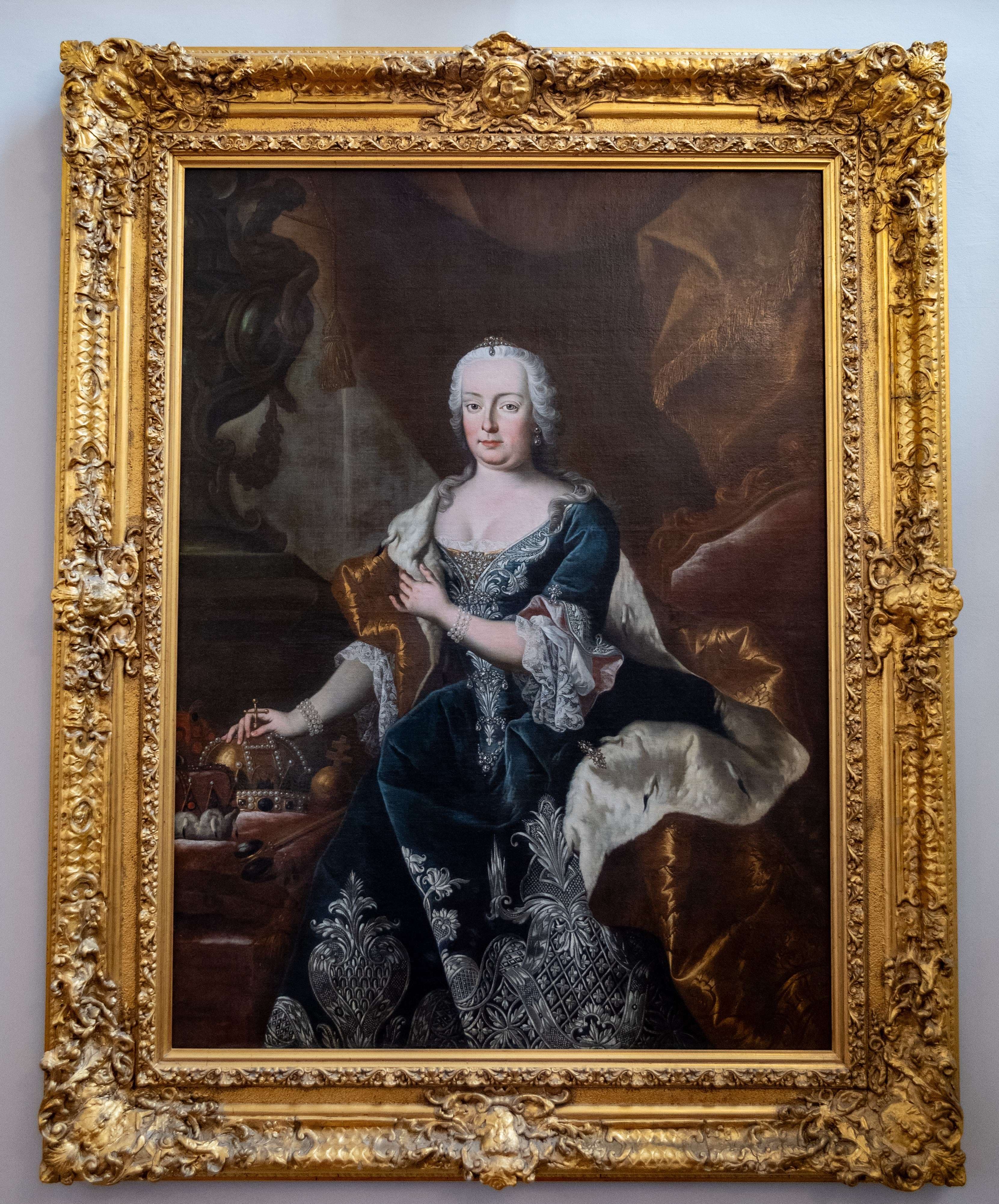 Arafed portrait of a woman in a blue dress sitting in a chair.