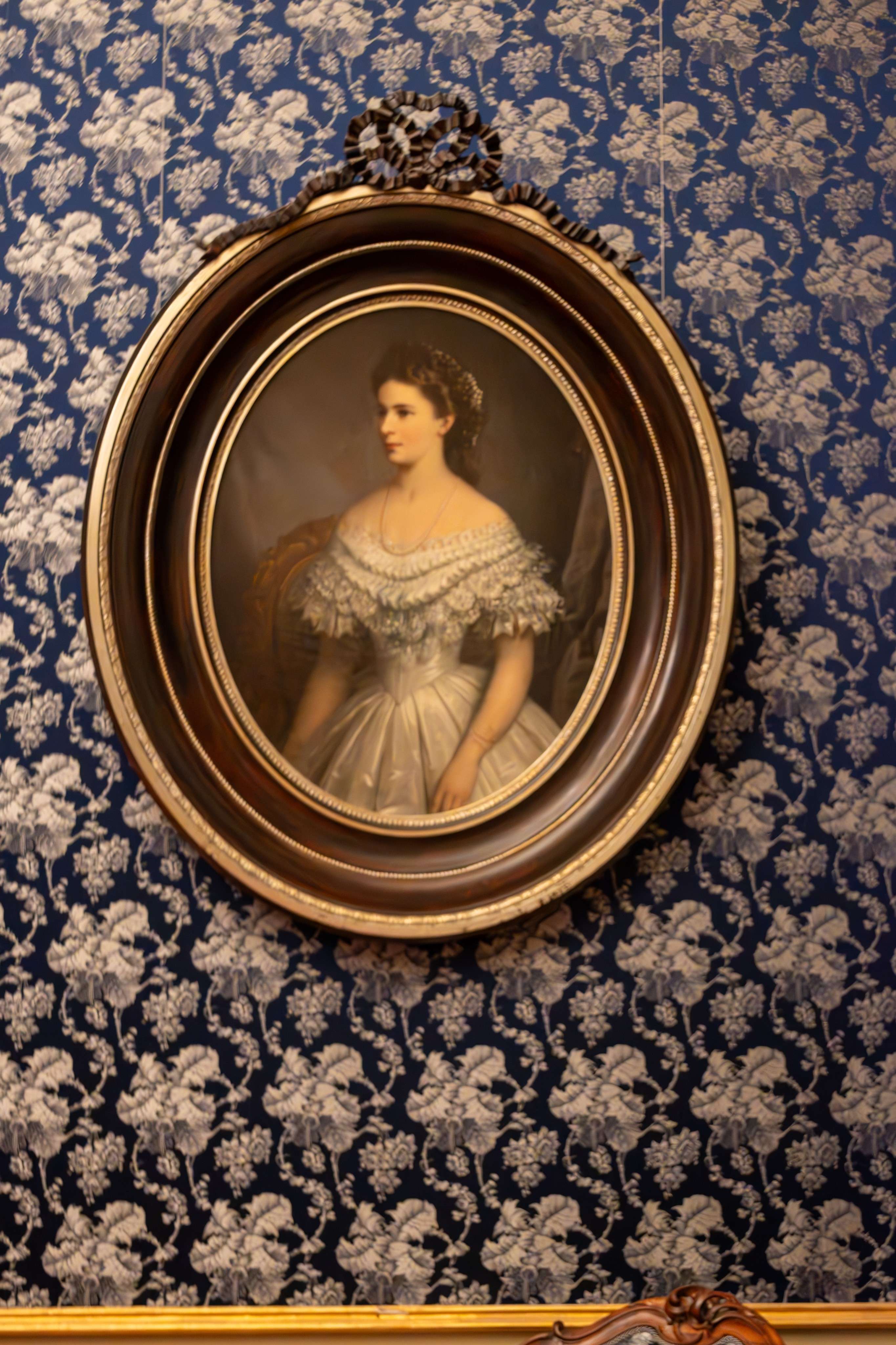 Arafed picture of a woman in a white dress in a blue room.