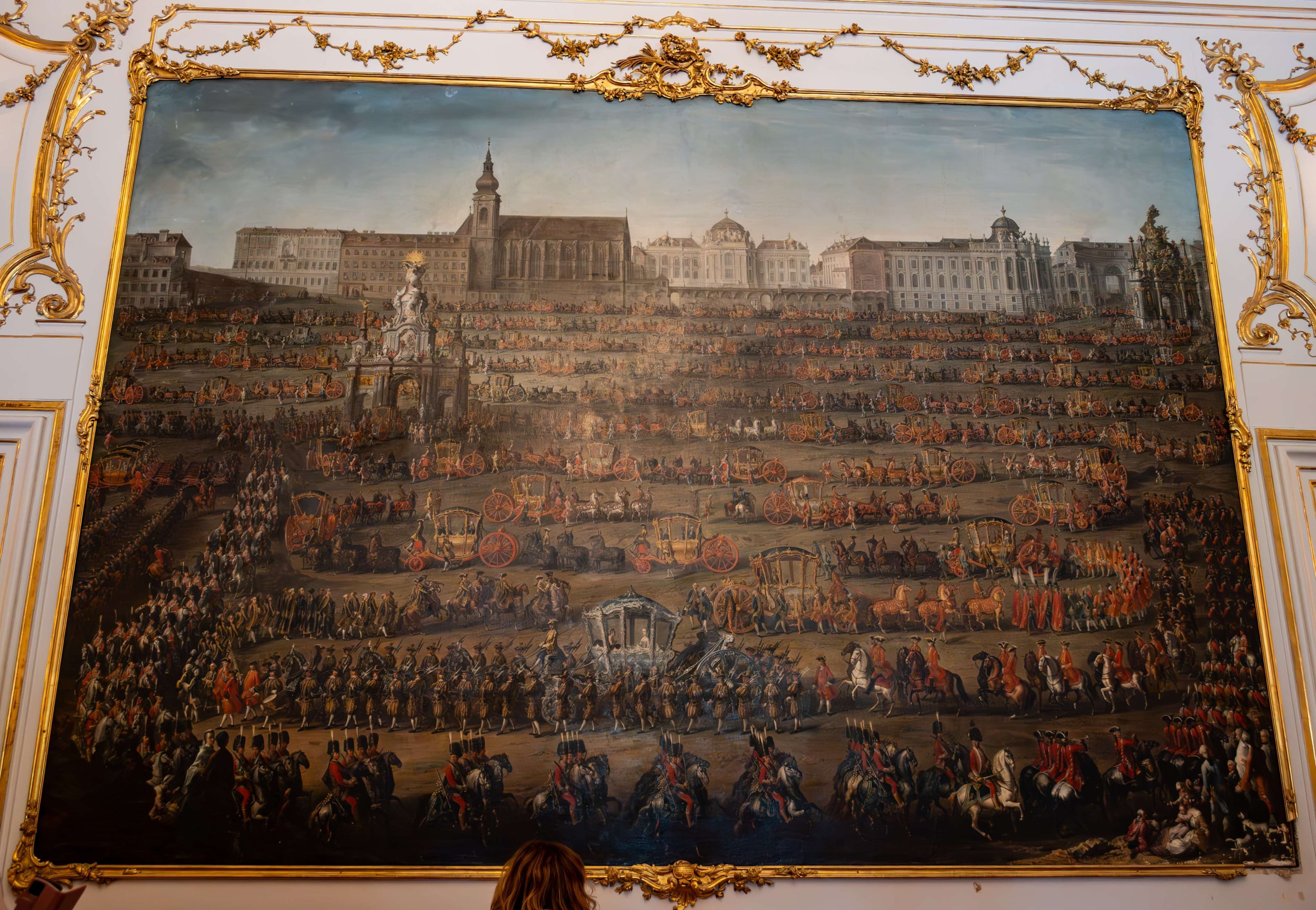 Painting of a large crowd of people in a large room.