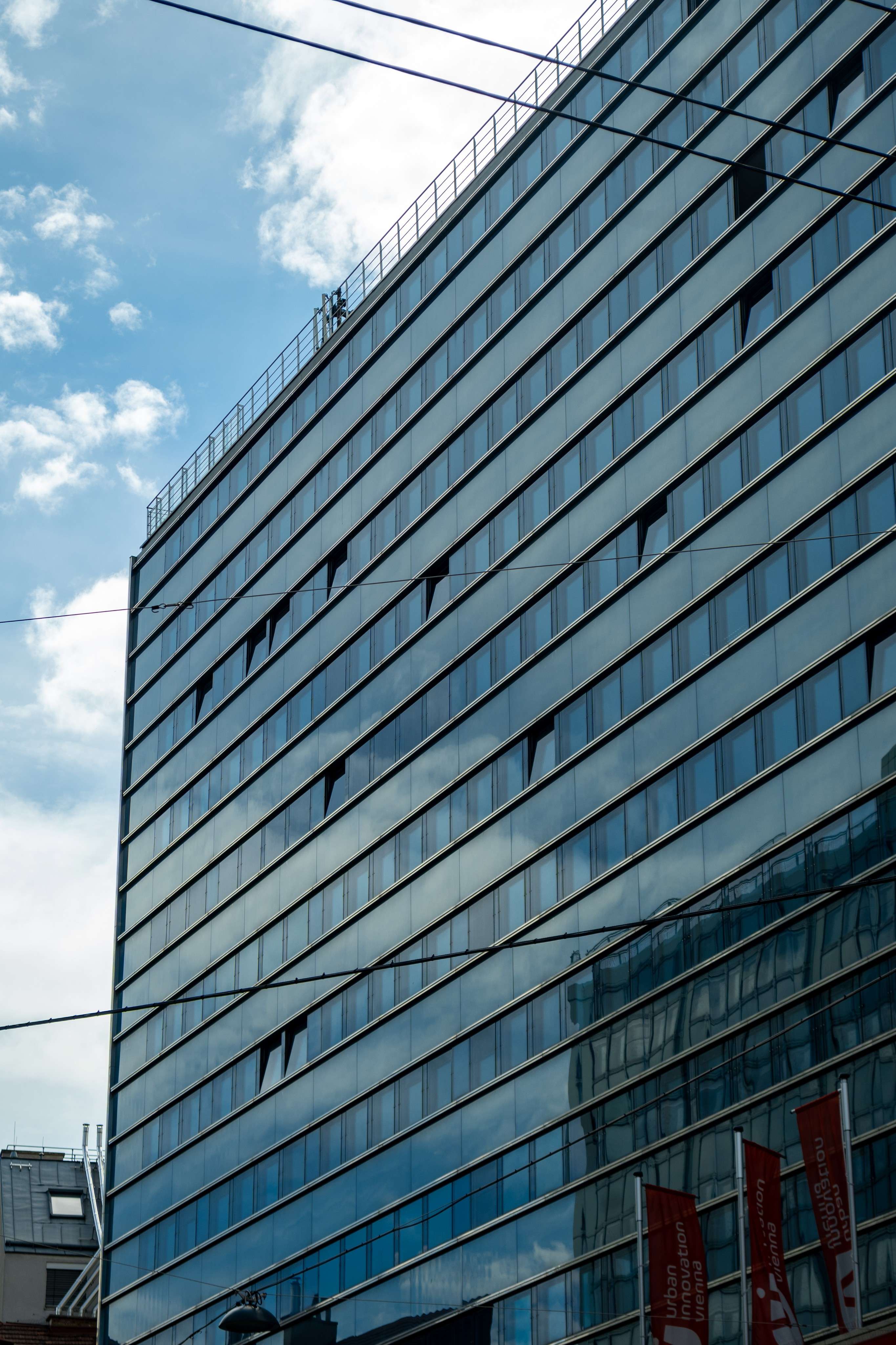 Arafly shot of a building with a clock on the top of it.