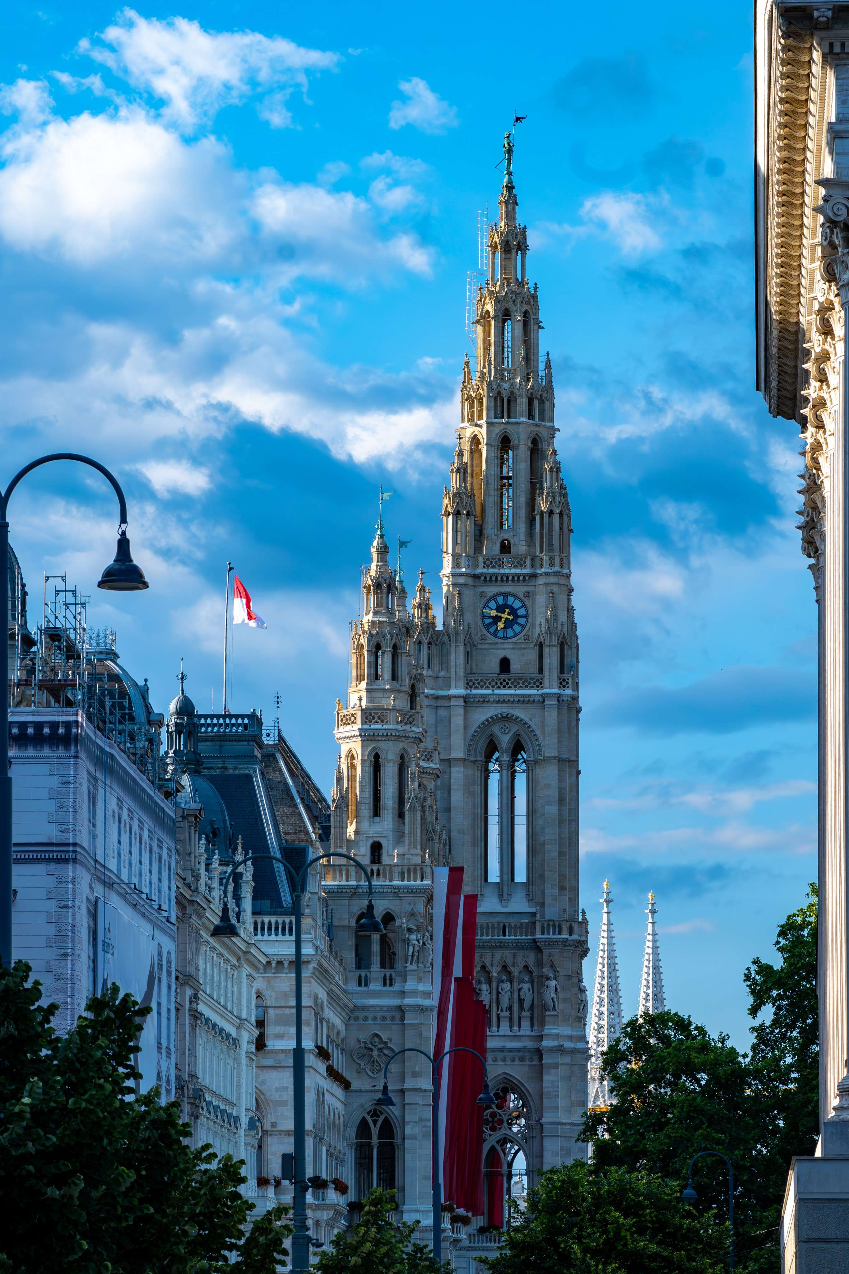 There is a clock tower on the side of a building.