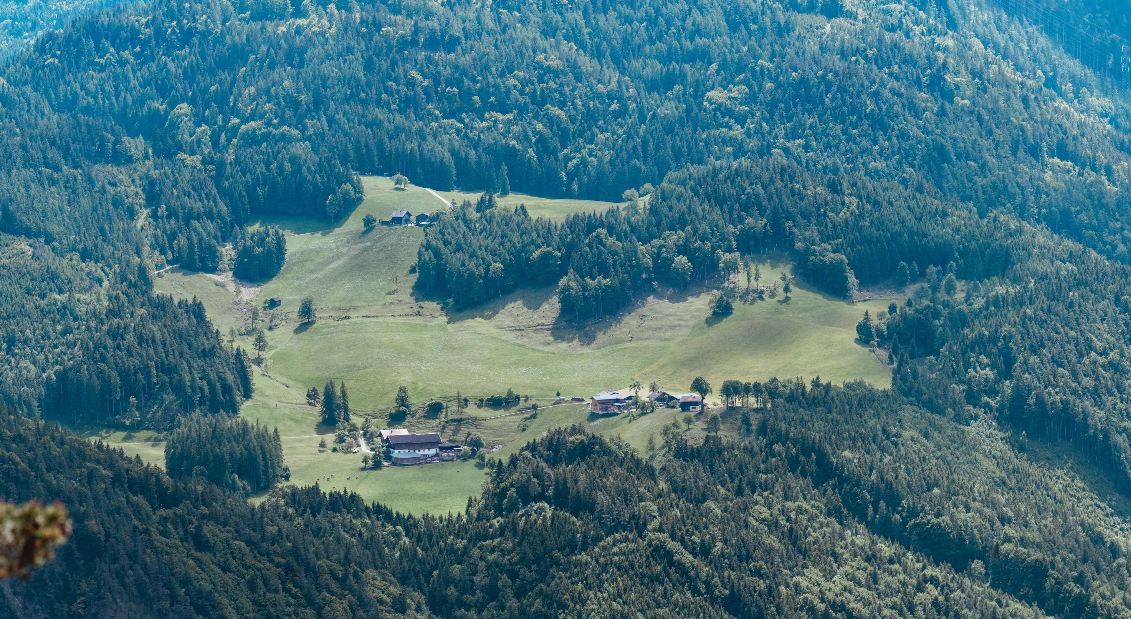 There is a view of a small village in the middle of a mountain.