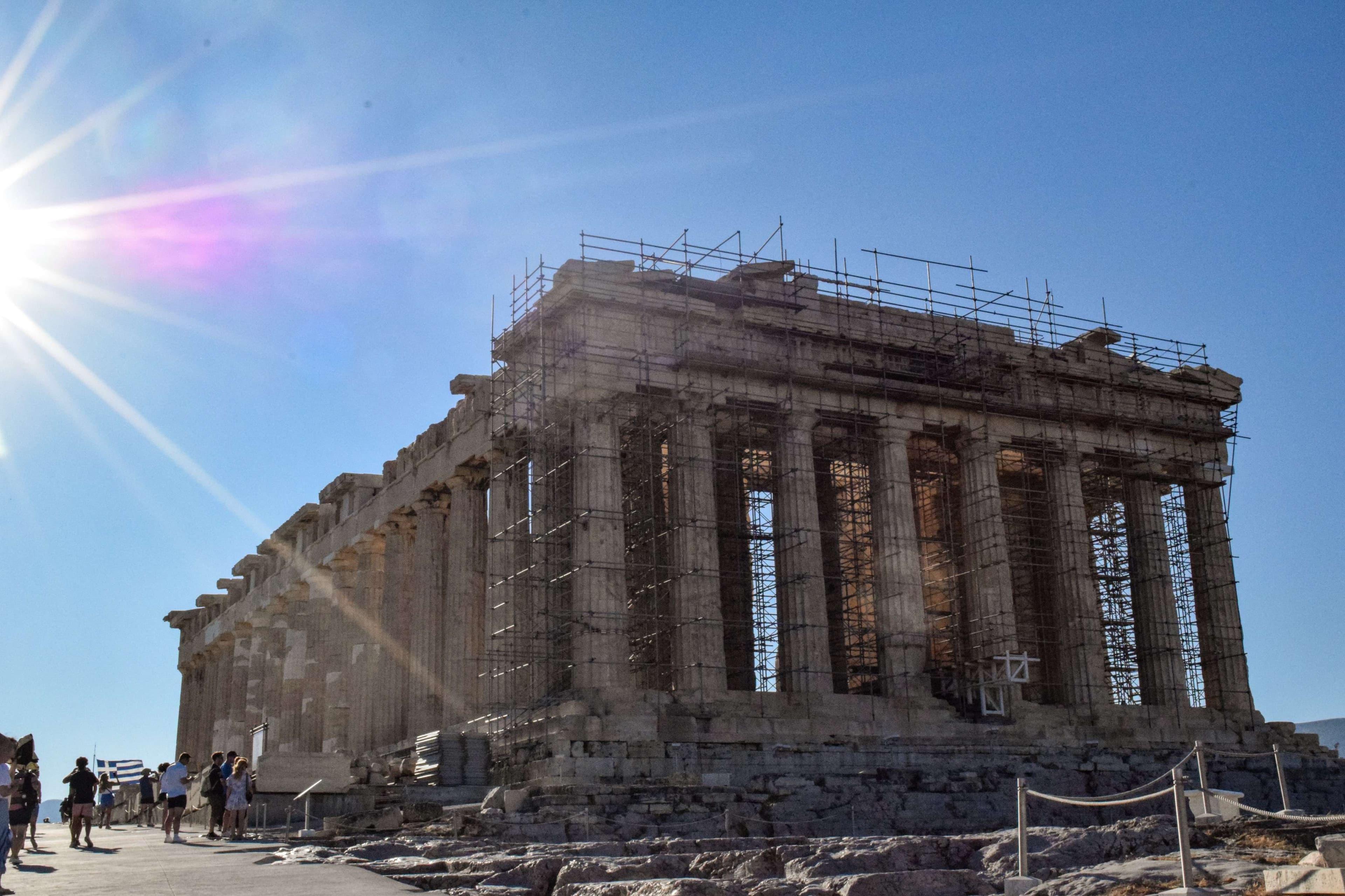 Arafed view of a large building with scaffolding on the top.